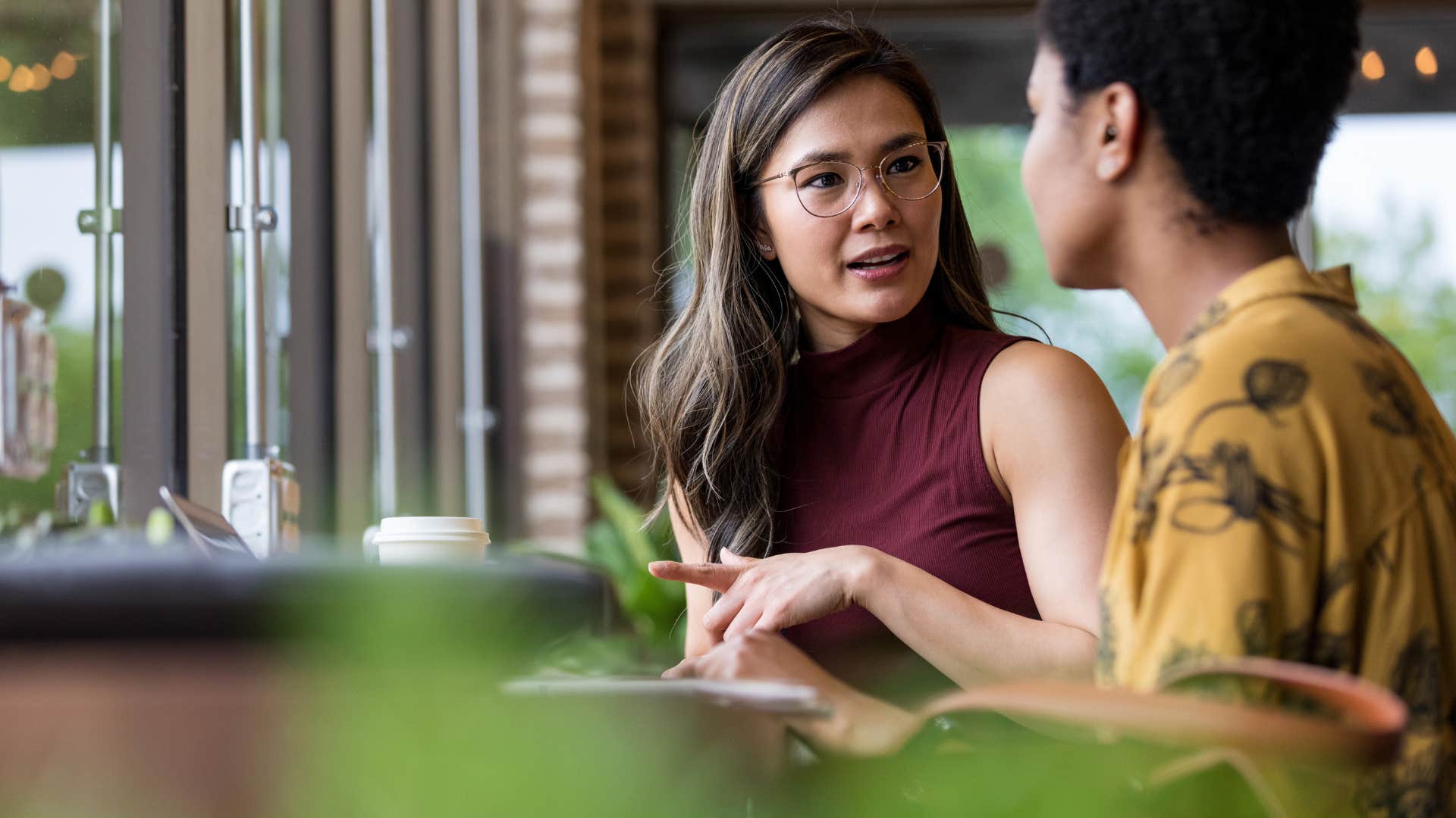 woman telling her friend they might have it wrong