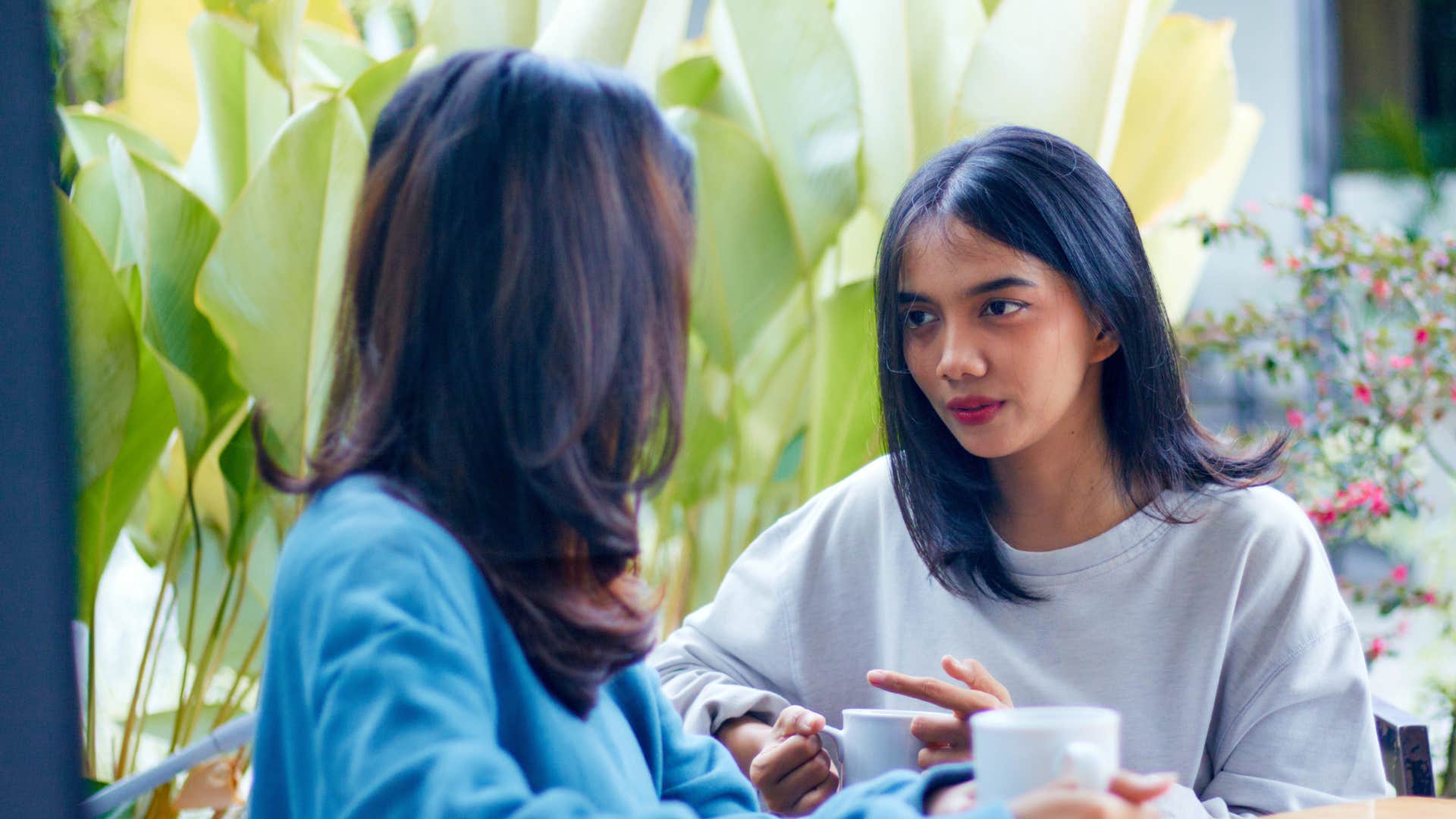 woman telling her friend something is more complicated than that