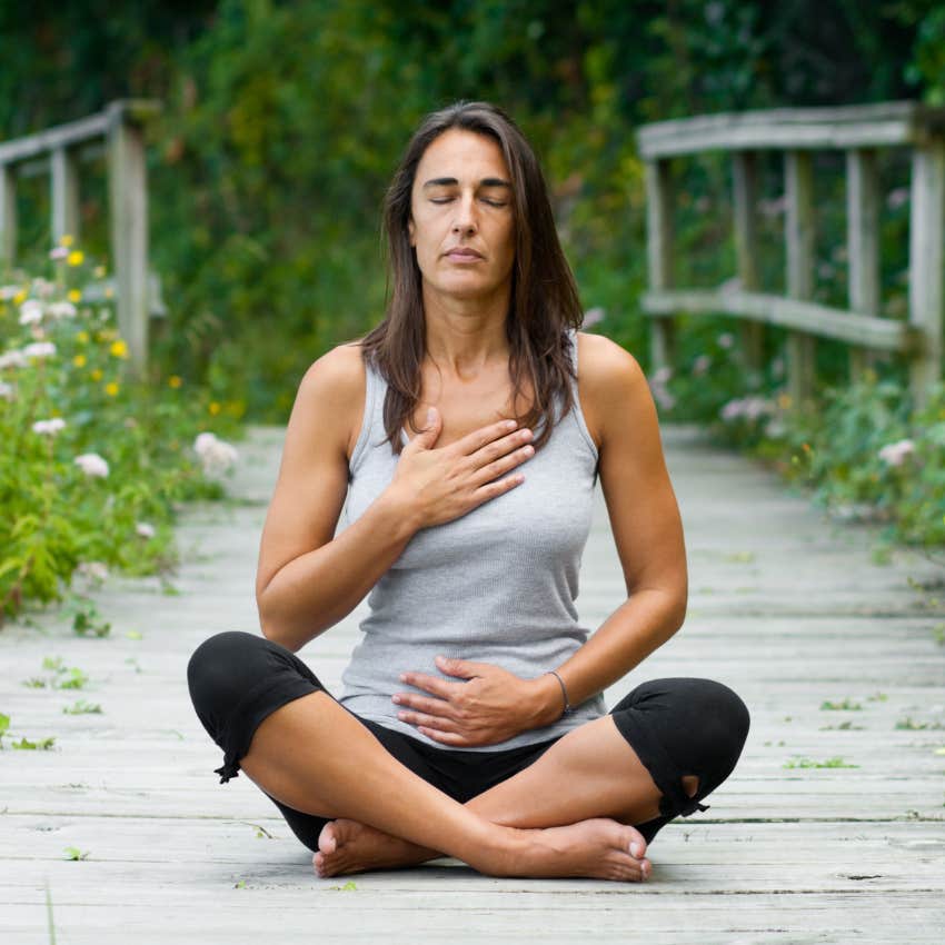 woman with intuitive intelligence meditating