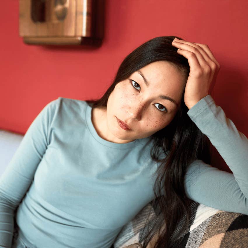 woman wondering why her life is boring and insufferable they're disconnected from themselves