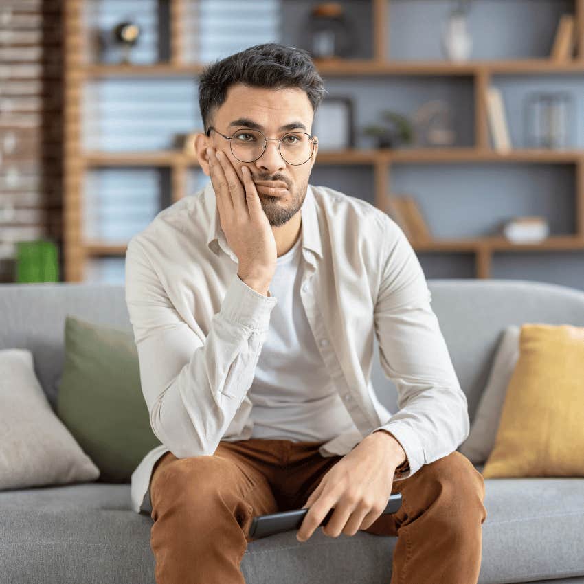 man wondering why his life is boring and insufferable thinking they don't deserve to be happy