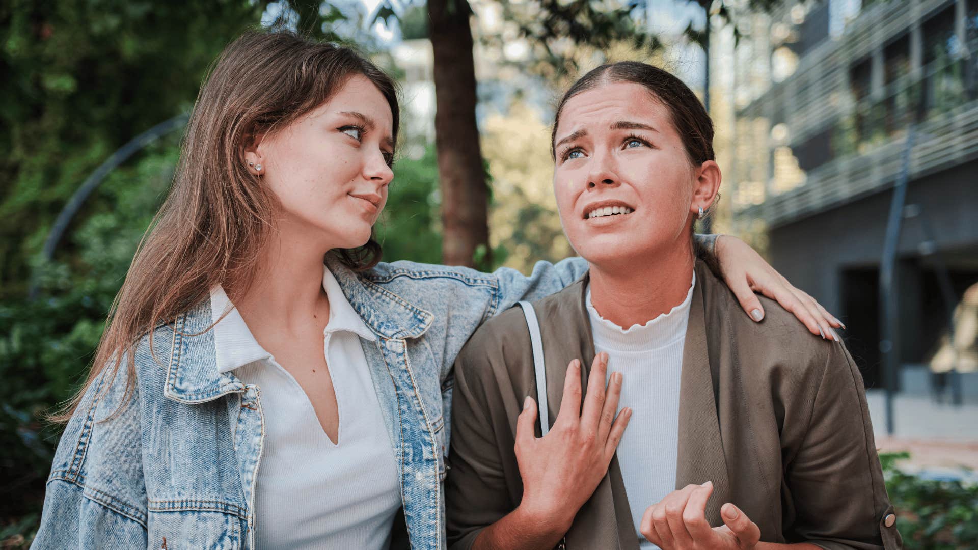 woman talking to frantic friend who can't handle bad news