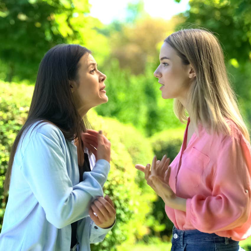 woman arguing with friend telling her whatever you need you're not getting it from me 