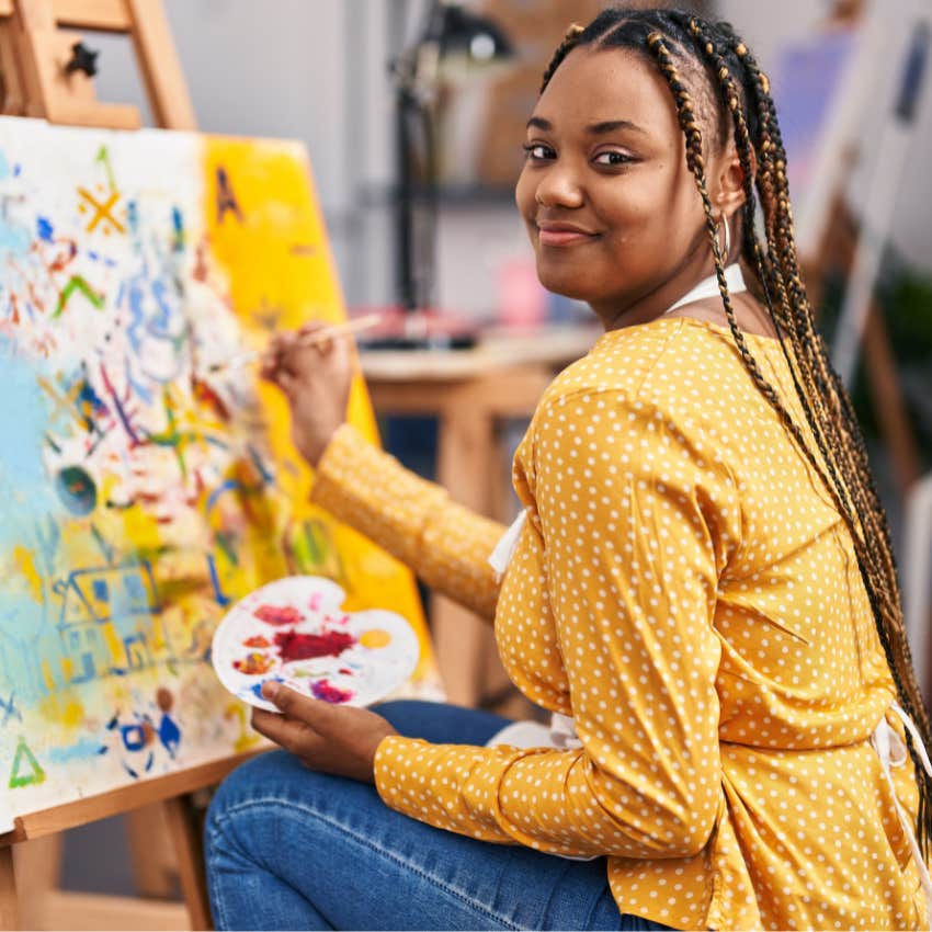 good woman creating art expressing her creativity