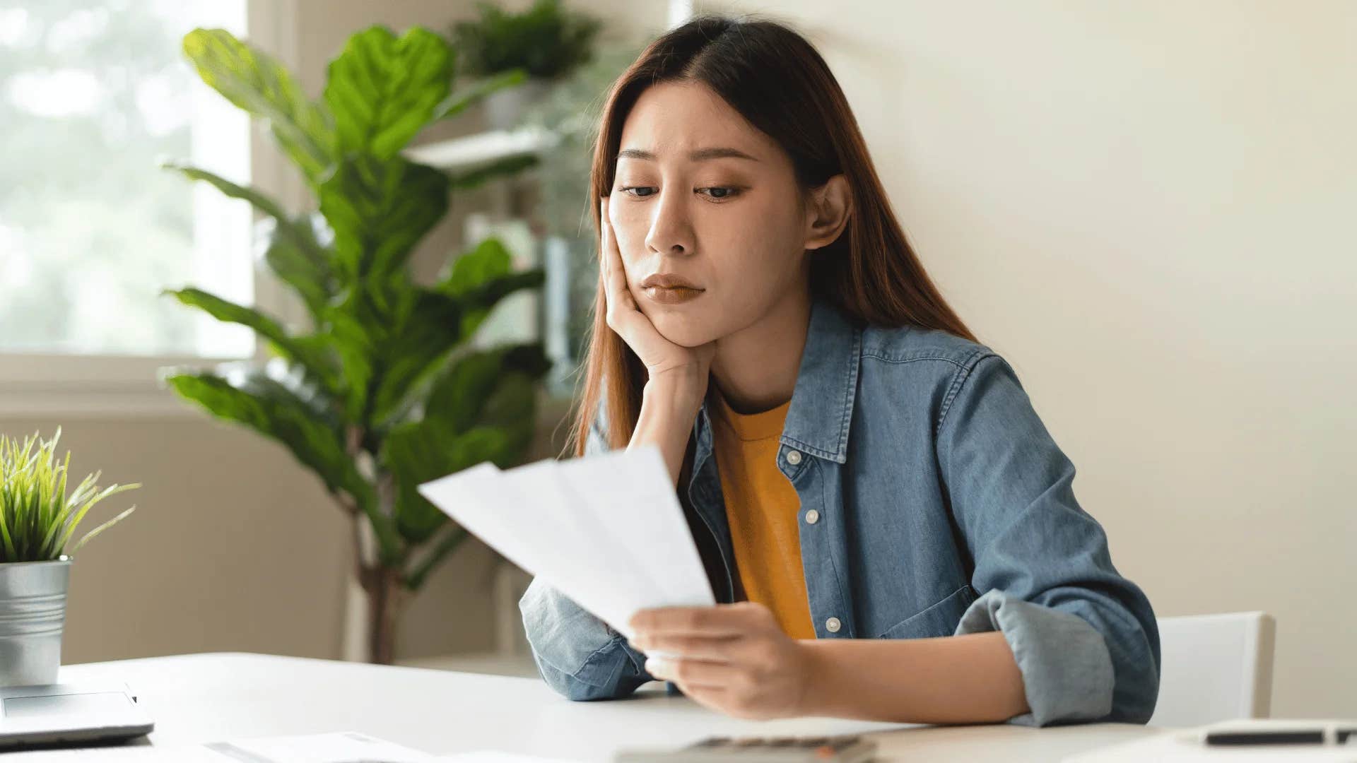 gen-z woman experiencing economic uncertainty