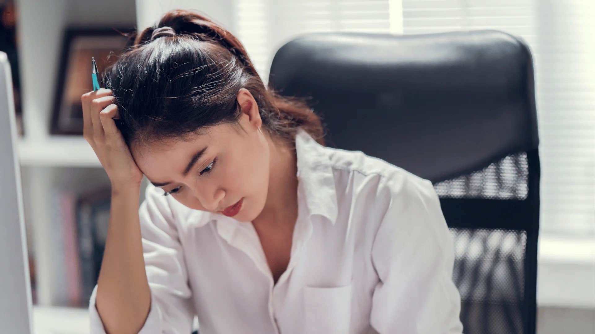 gen-z woman struggling with traditional hierarchies at work