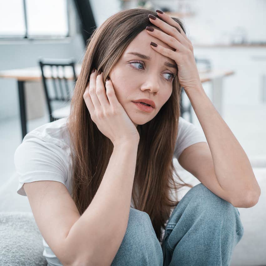 sad young woman scared to be vulnerable with others
