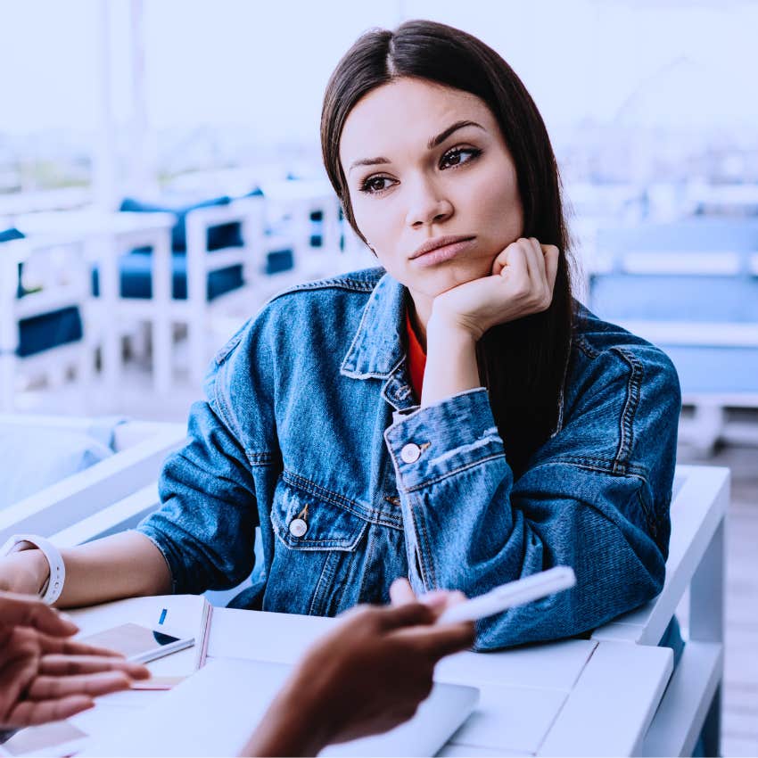 sensitive woman noticing lies and deceit in colleague