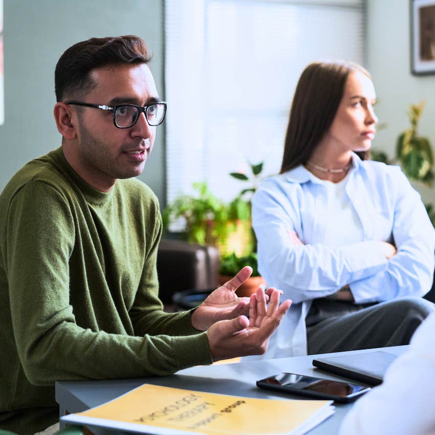sensitive man sensing bad energy in woman's partner