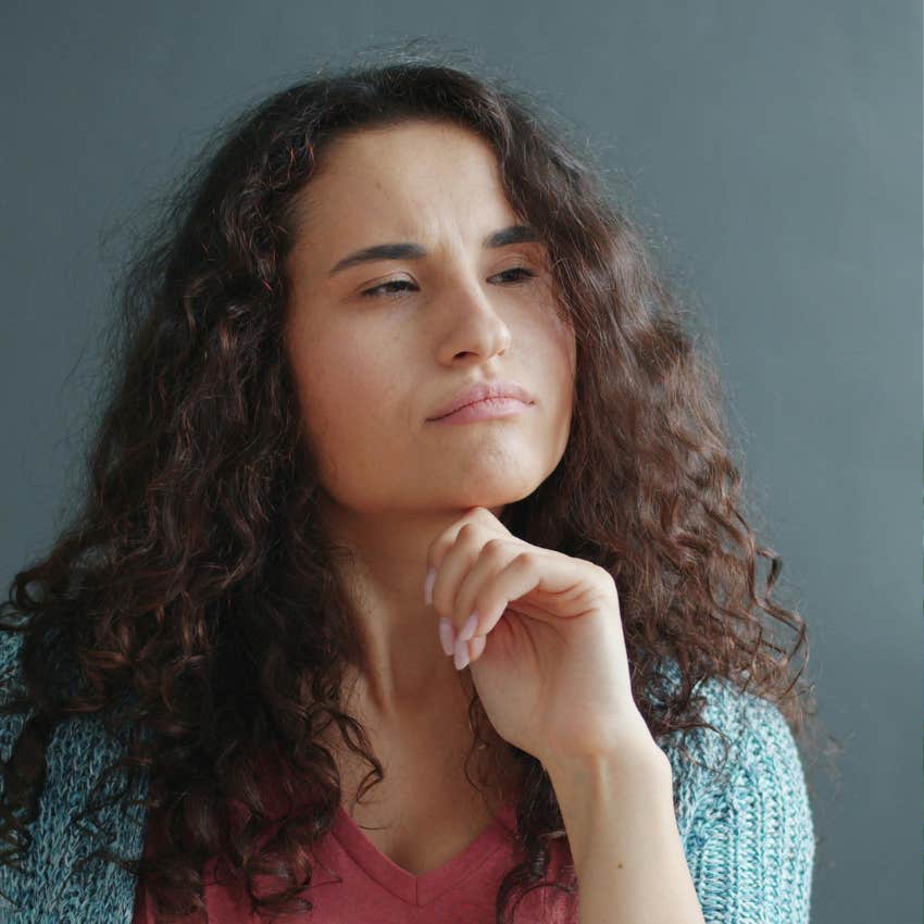 suspicious woman questioning why something good is happening to her