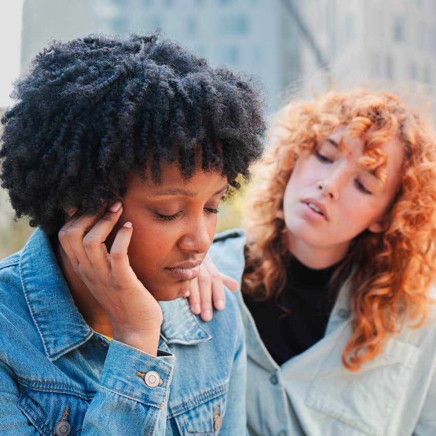 big-hearted woman listening intently to upset friend