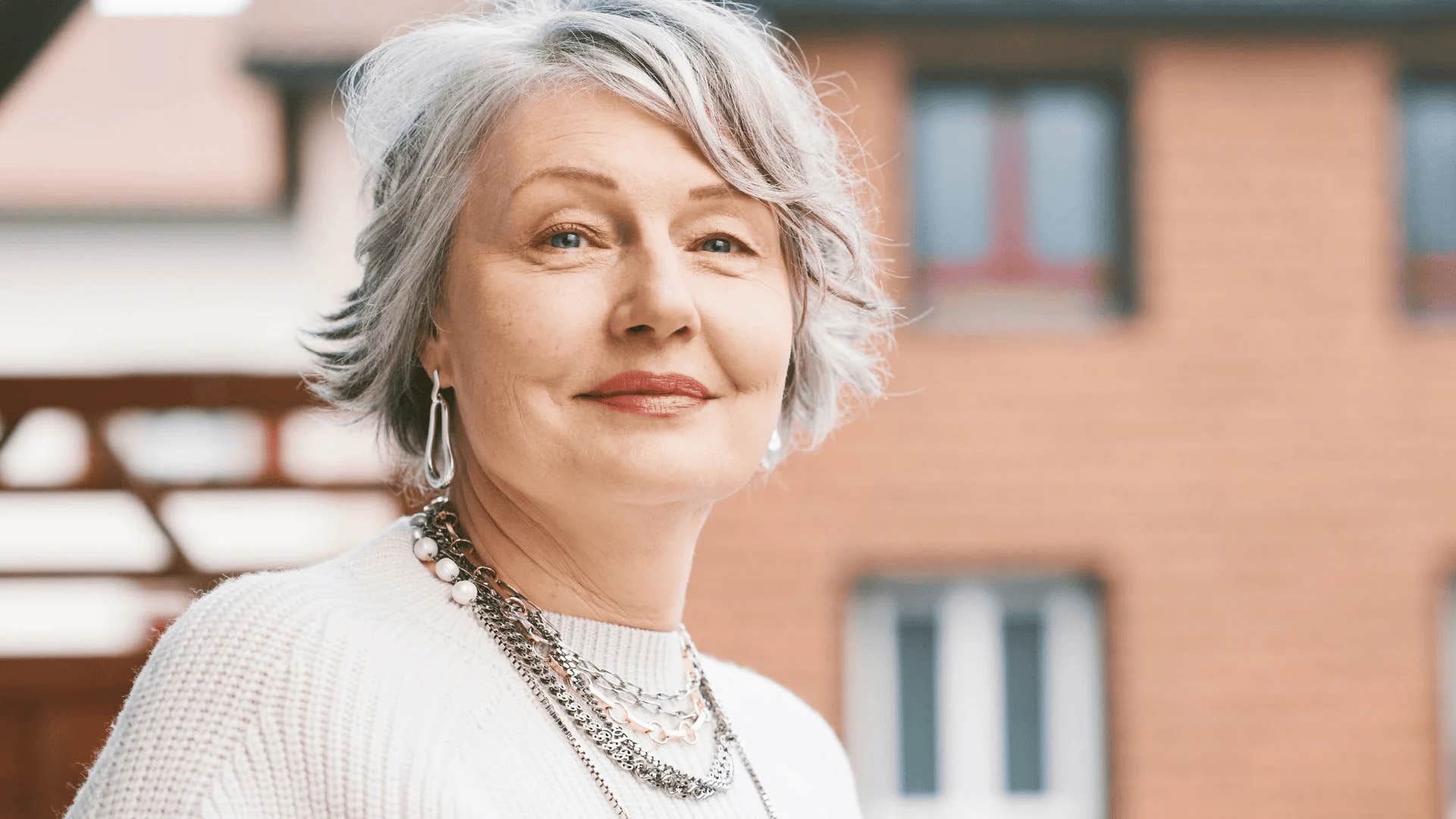 fancy boomer woman wearing expensive jewelry