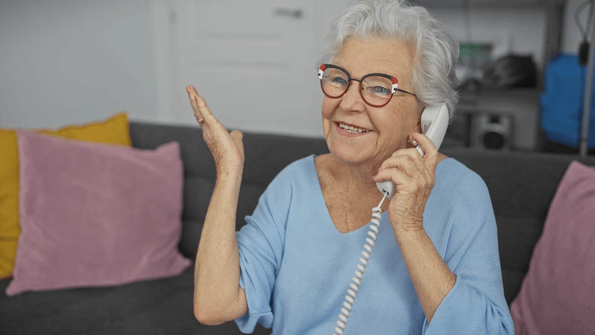 boomer woman talking on a landline phone