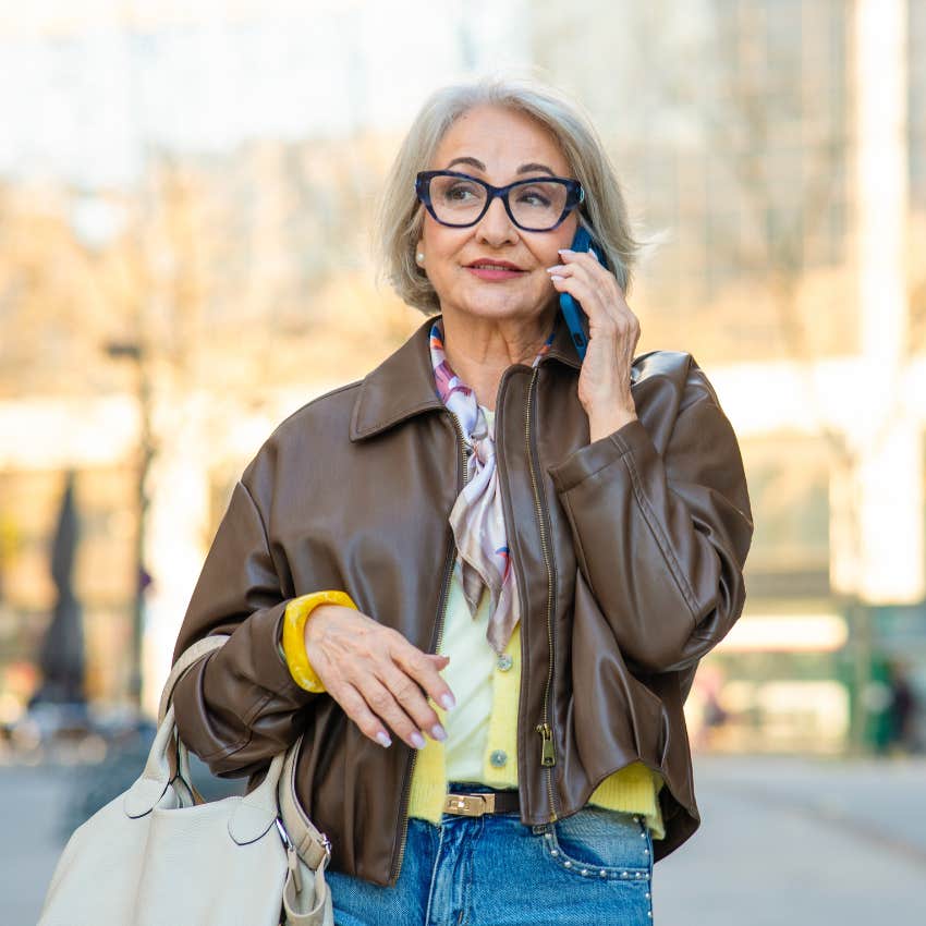 boomer woman perfectly happy talking on her own phone has no interest in buying the new iphone