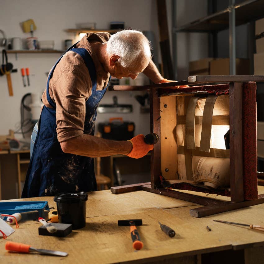 boomer man repairing a piece of furniture that broke instead of replacing it