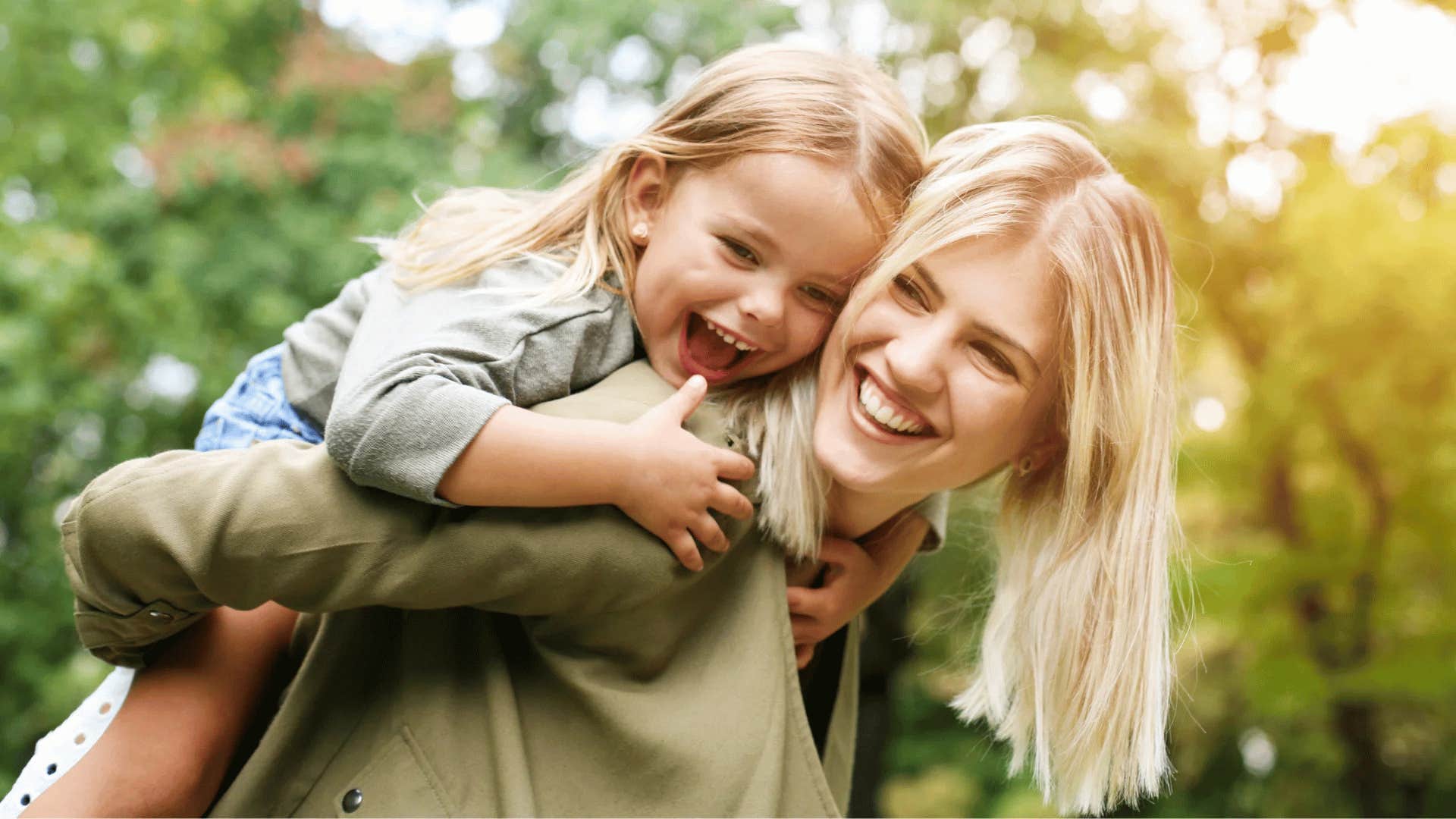 mom giving daughter a piggyback ride teaching her to be grateful