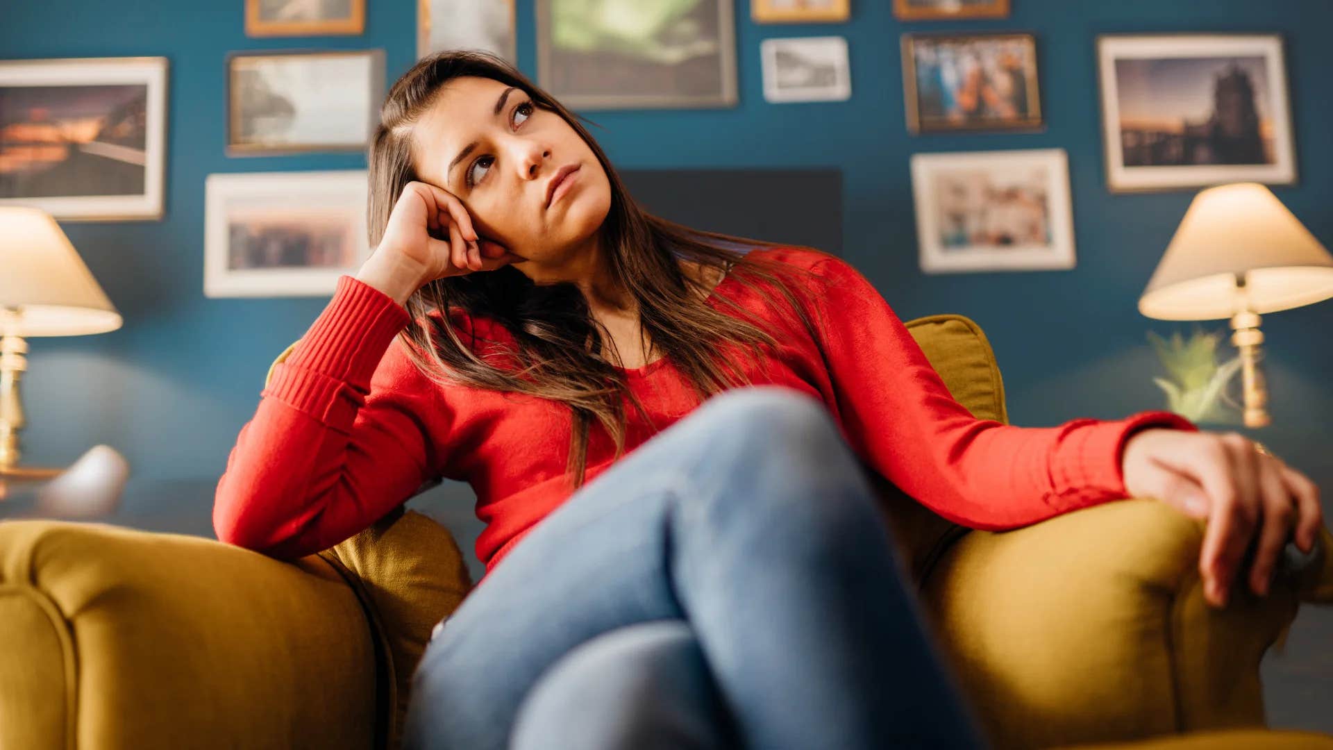highly intelligent woman thinking negative thoughts at home
