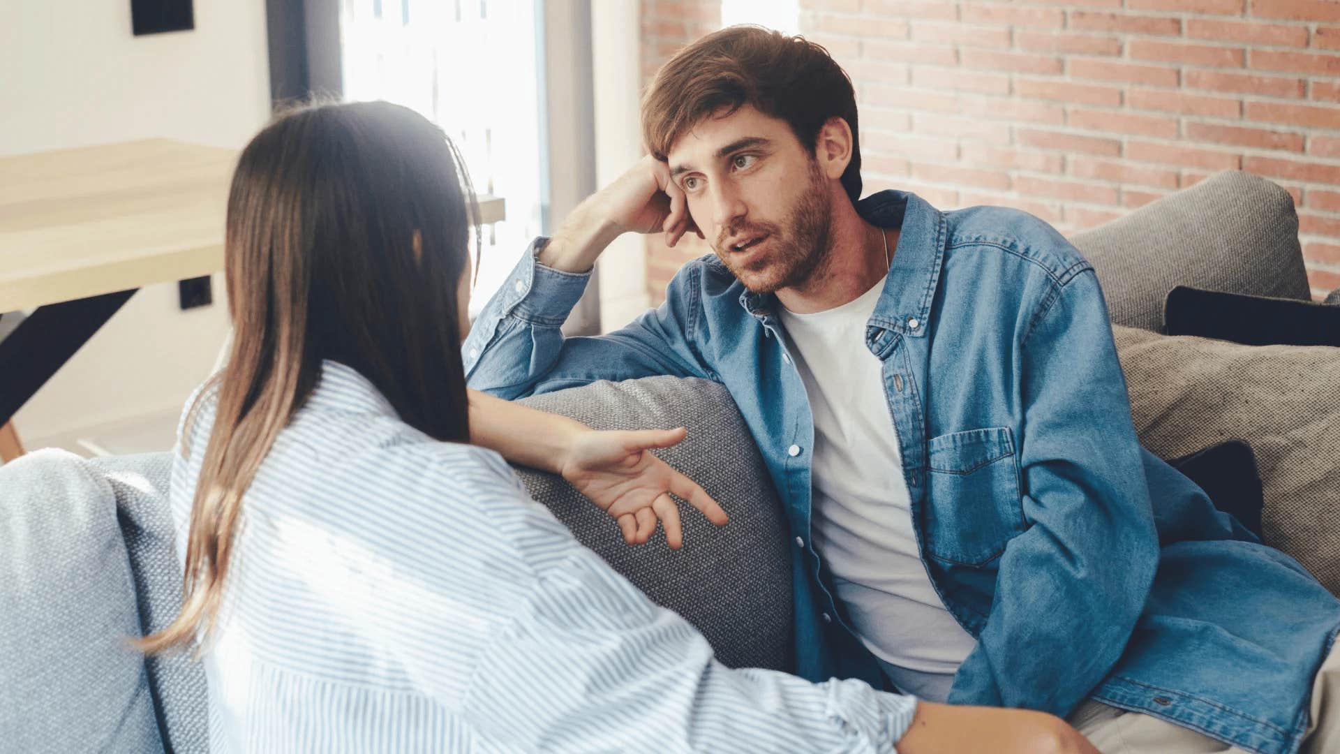 smart man talking to friend who thinks he's arrogant