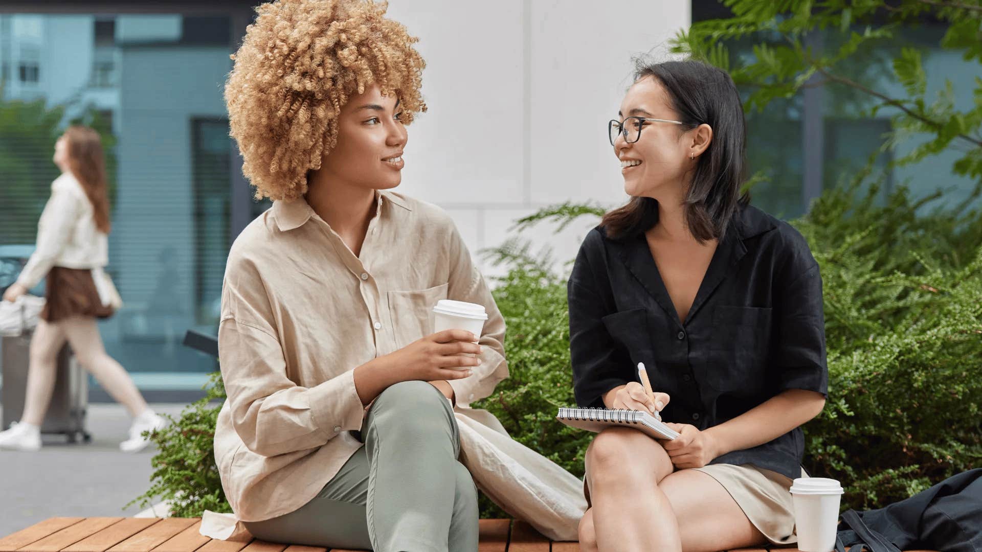 highly intelligent woman in conversation with friend outside