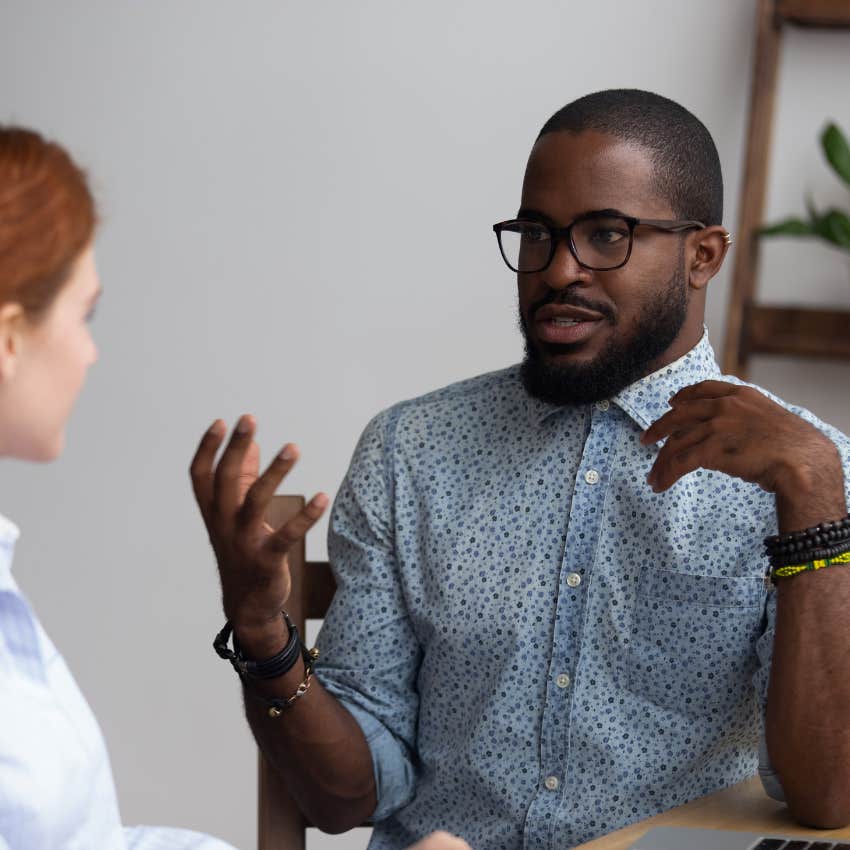 high-IQ man having trouble connecting with work colleague