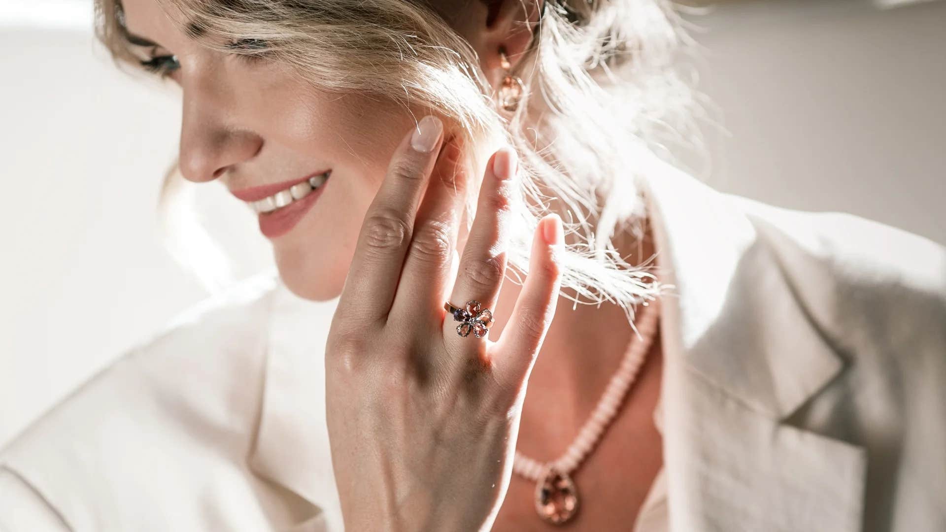 gen X woman showing off diamond ring on her finger
