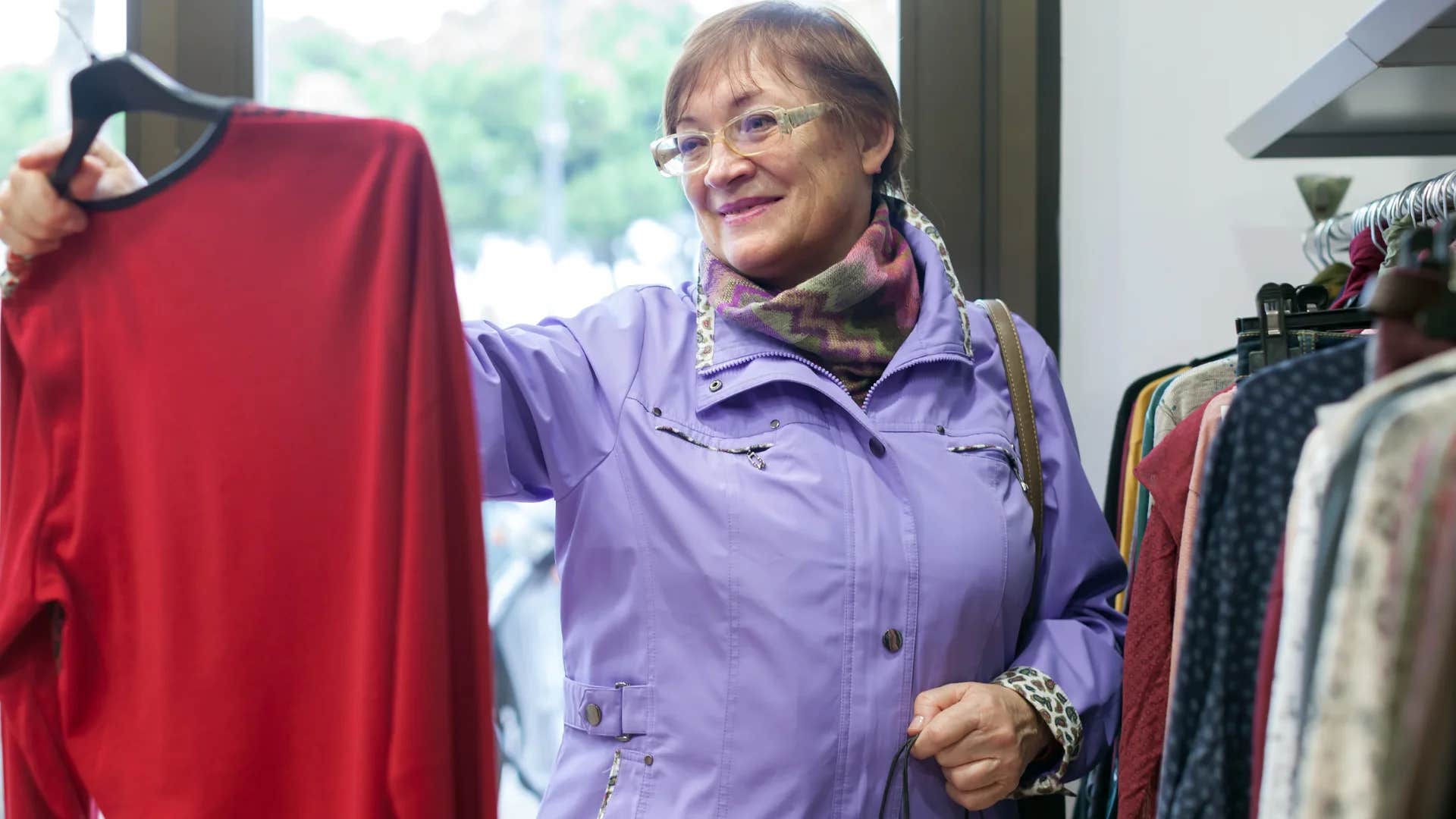 boomer woman doing her shopping inside a store