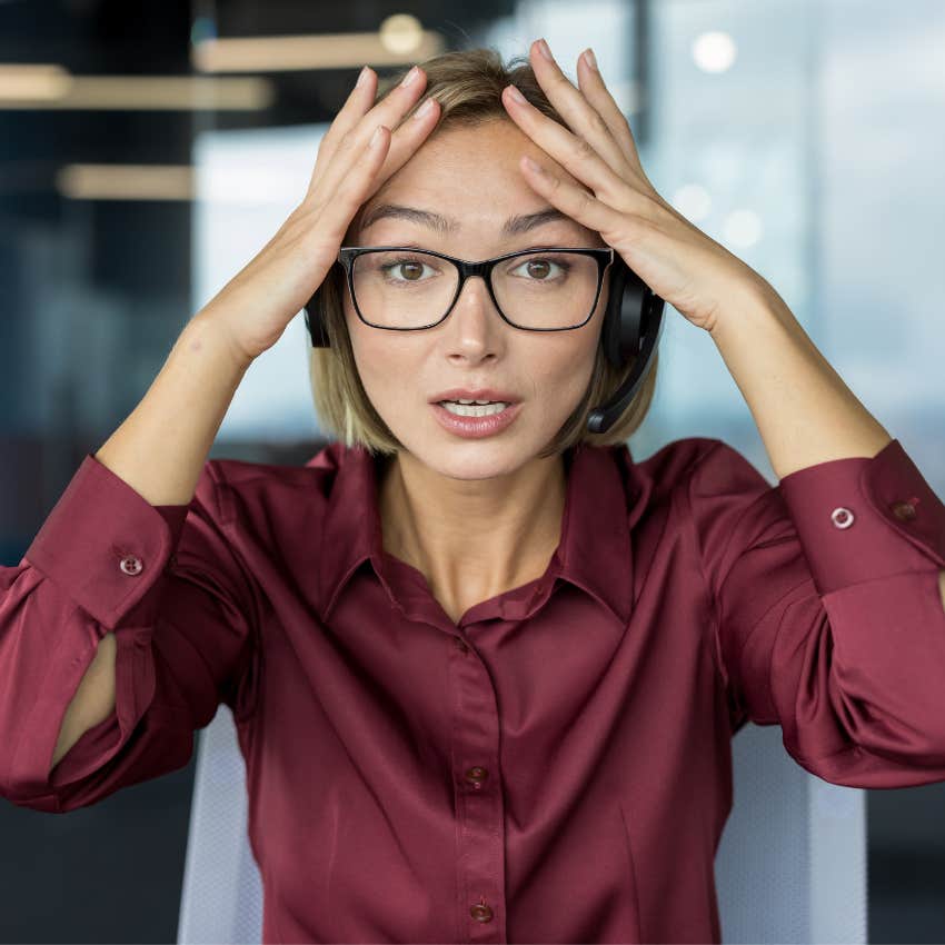 overwhelmed woman at work dealing with too many things at once