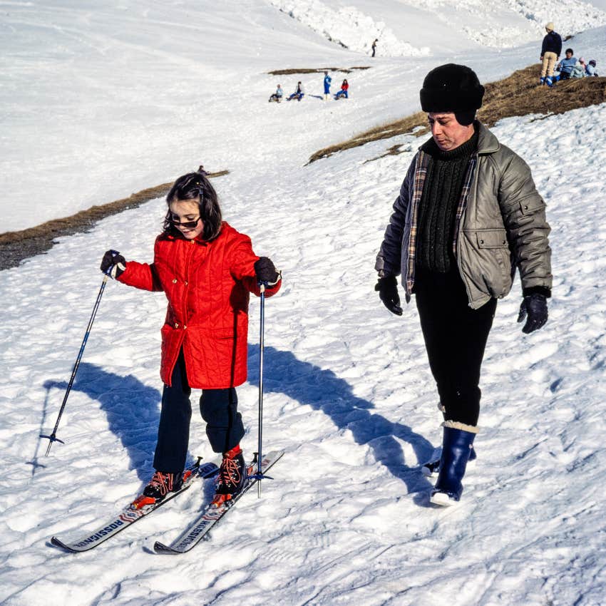 boomer dad supporting his daughter's passion for skiing