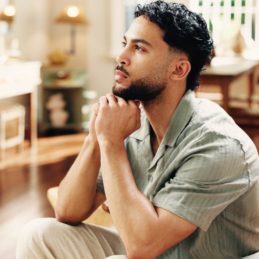 man who doubts himself turning to self-reflection