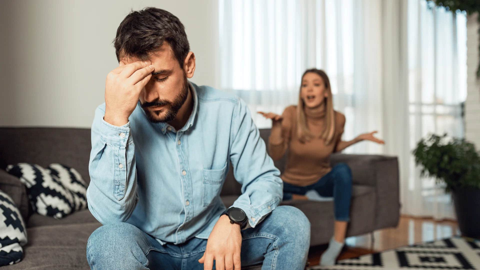 man frustrated with woman who refuses to compromise