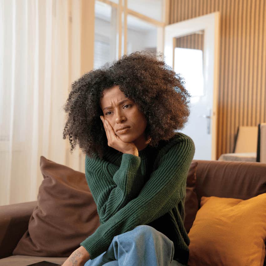 chronically unhappy woman telling herself it's weak to depend on a man