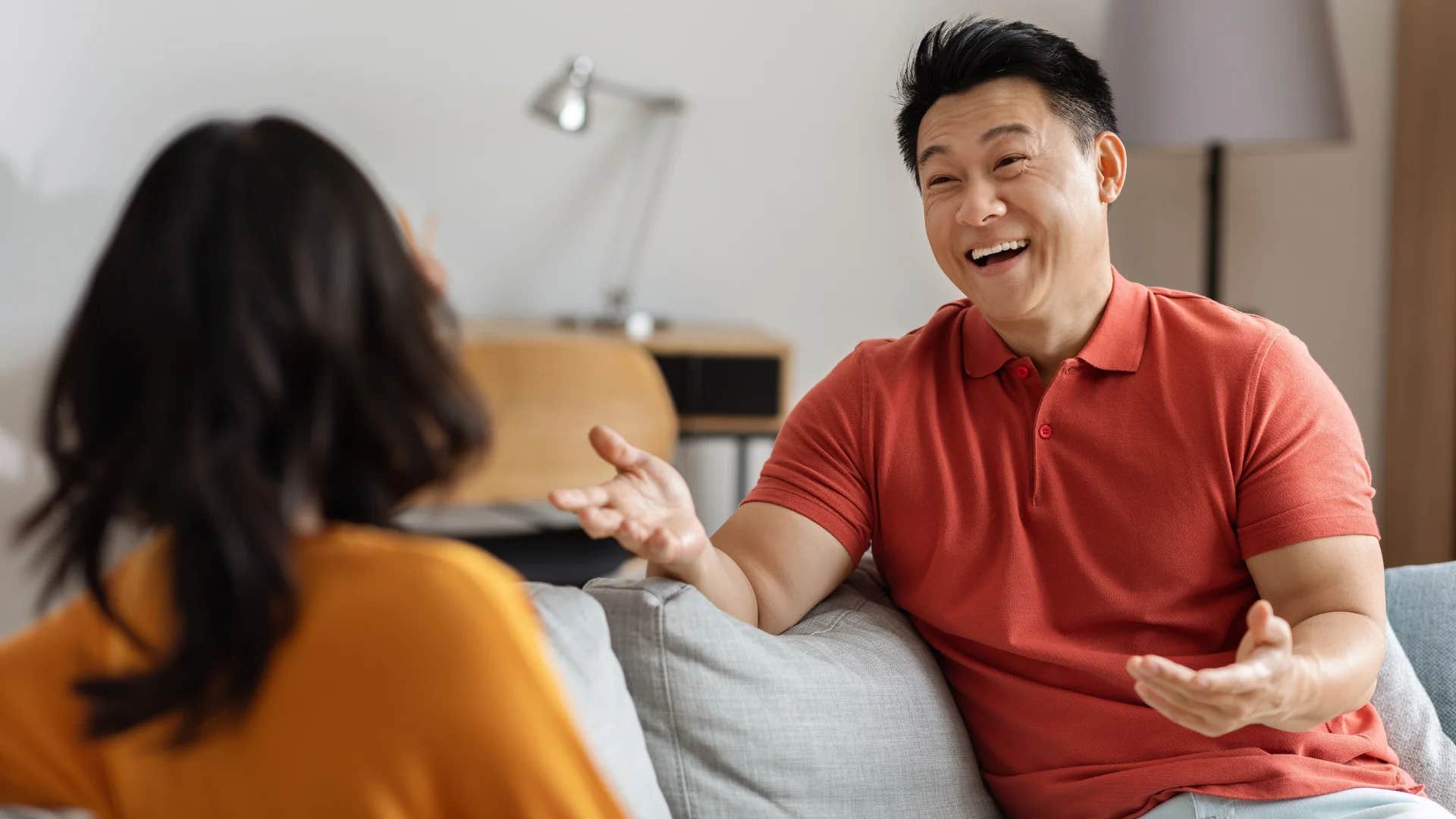 happy man hearing woman ask hey can we talk about what happened earlier