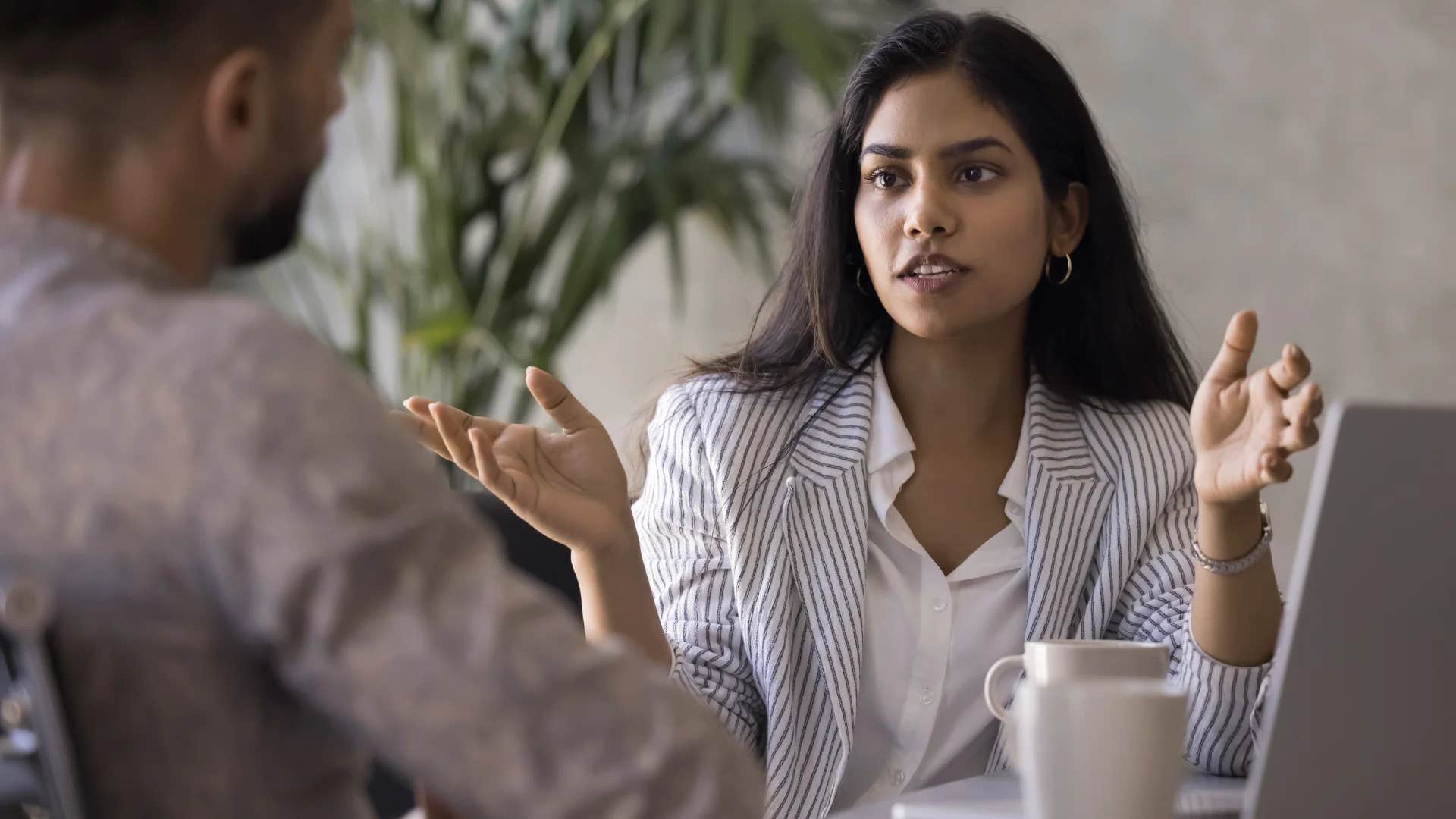 assertive woman telling man i don't have to prove myself to you