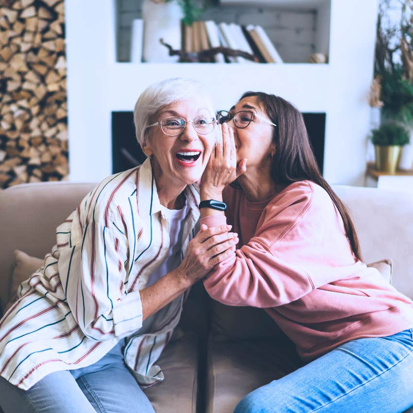 older women gossiping smiling 