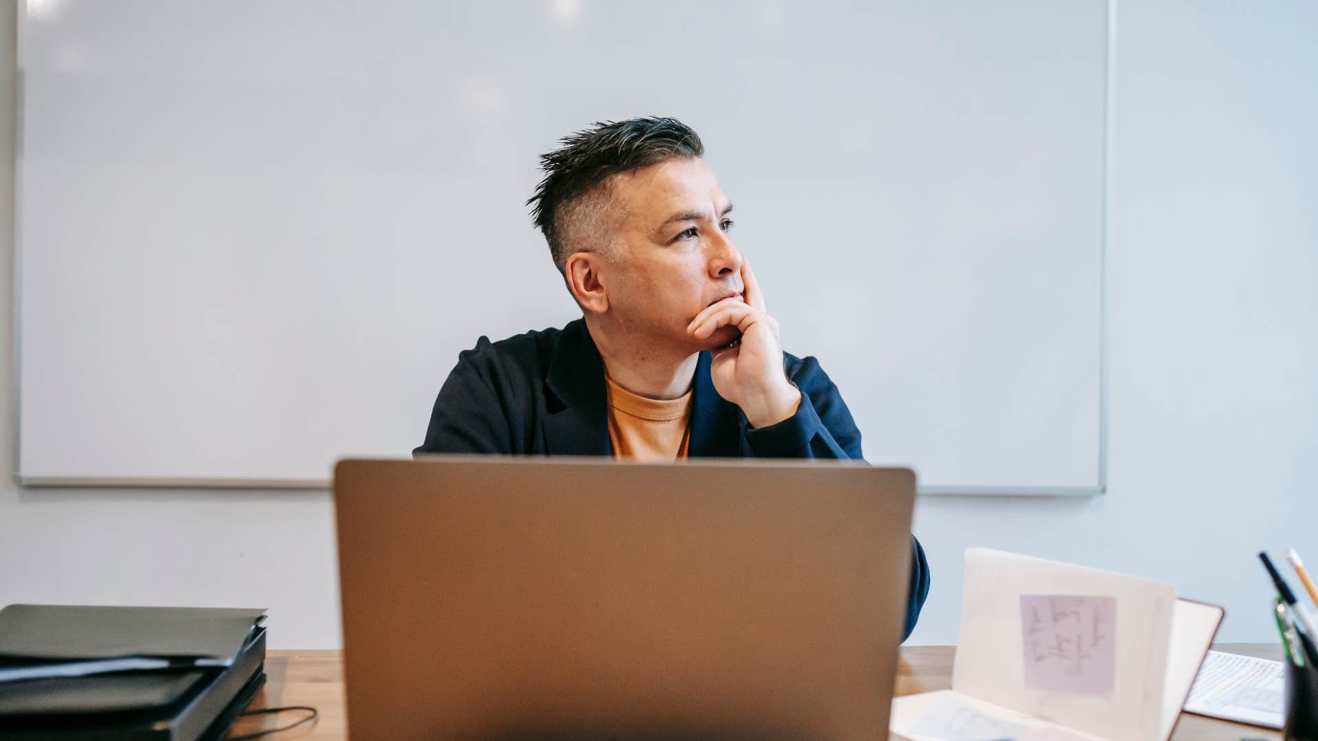 man thinking deeply