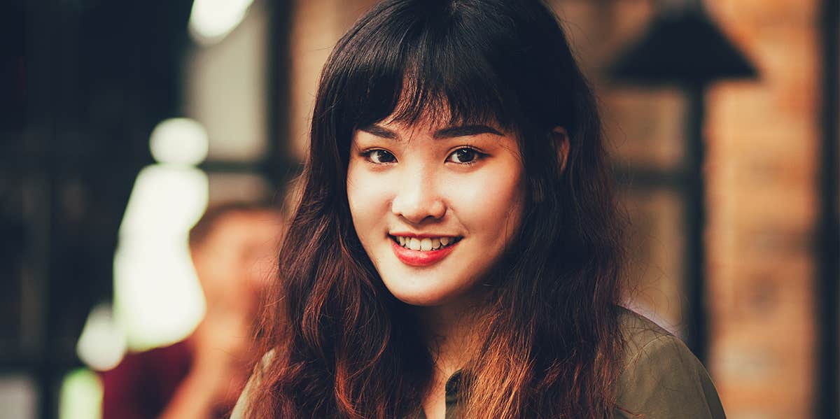 Things Women Who Live The Most Joyful Lives Do Differently smiling woman
