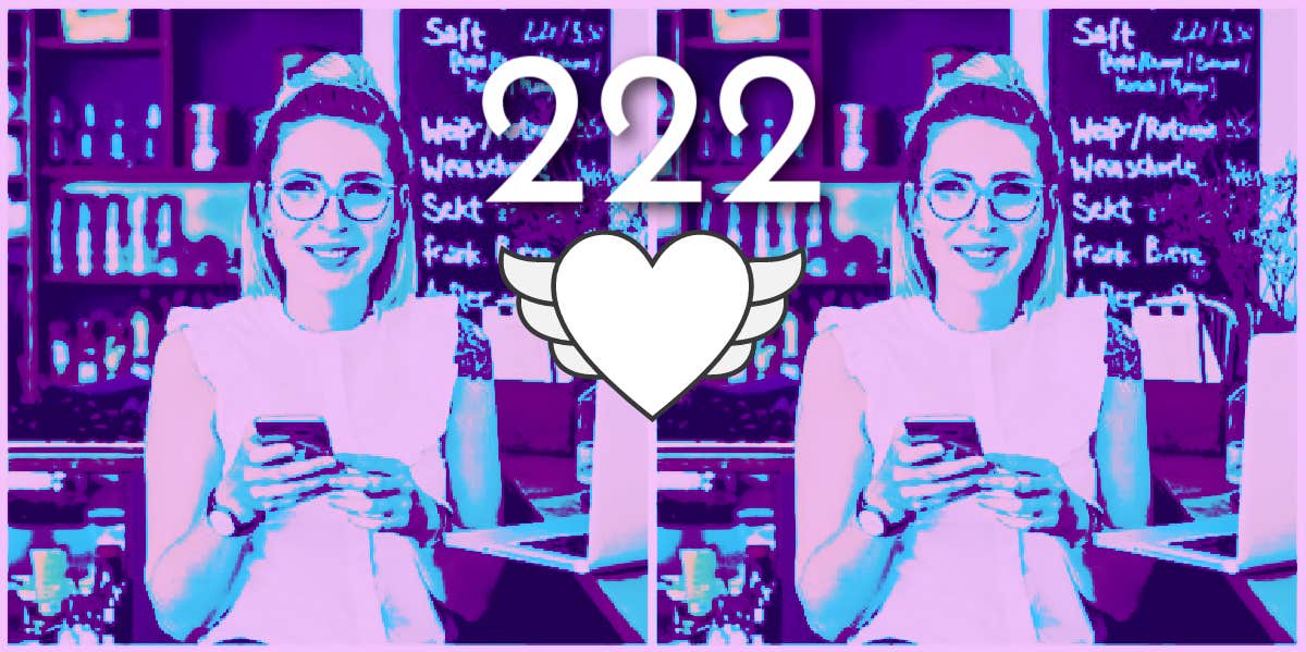 Angel Number 222 — Spiritual Meaning & Symbolism woman smiling after seeing angel number 222 on her smartphone