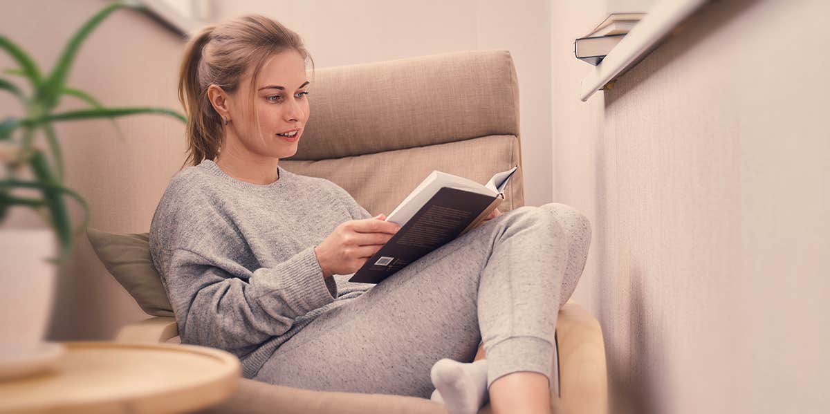 woman reading book