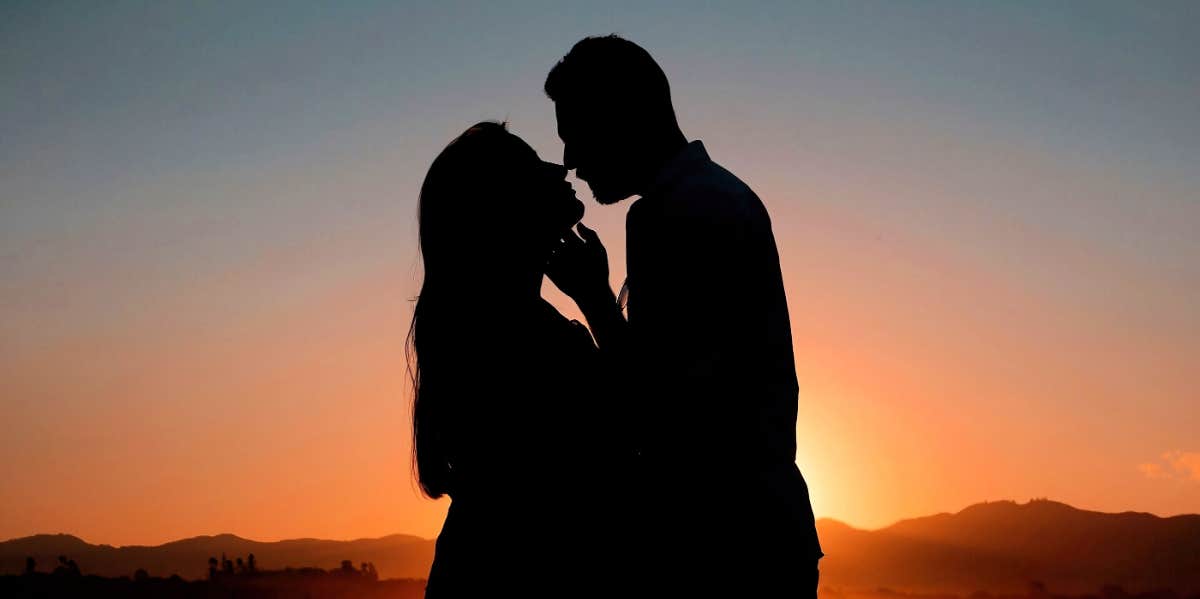 3 Secrets To Strengthen Any "Rough Patch" Relationship silhouette of man and woman kissing at sunset
