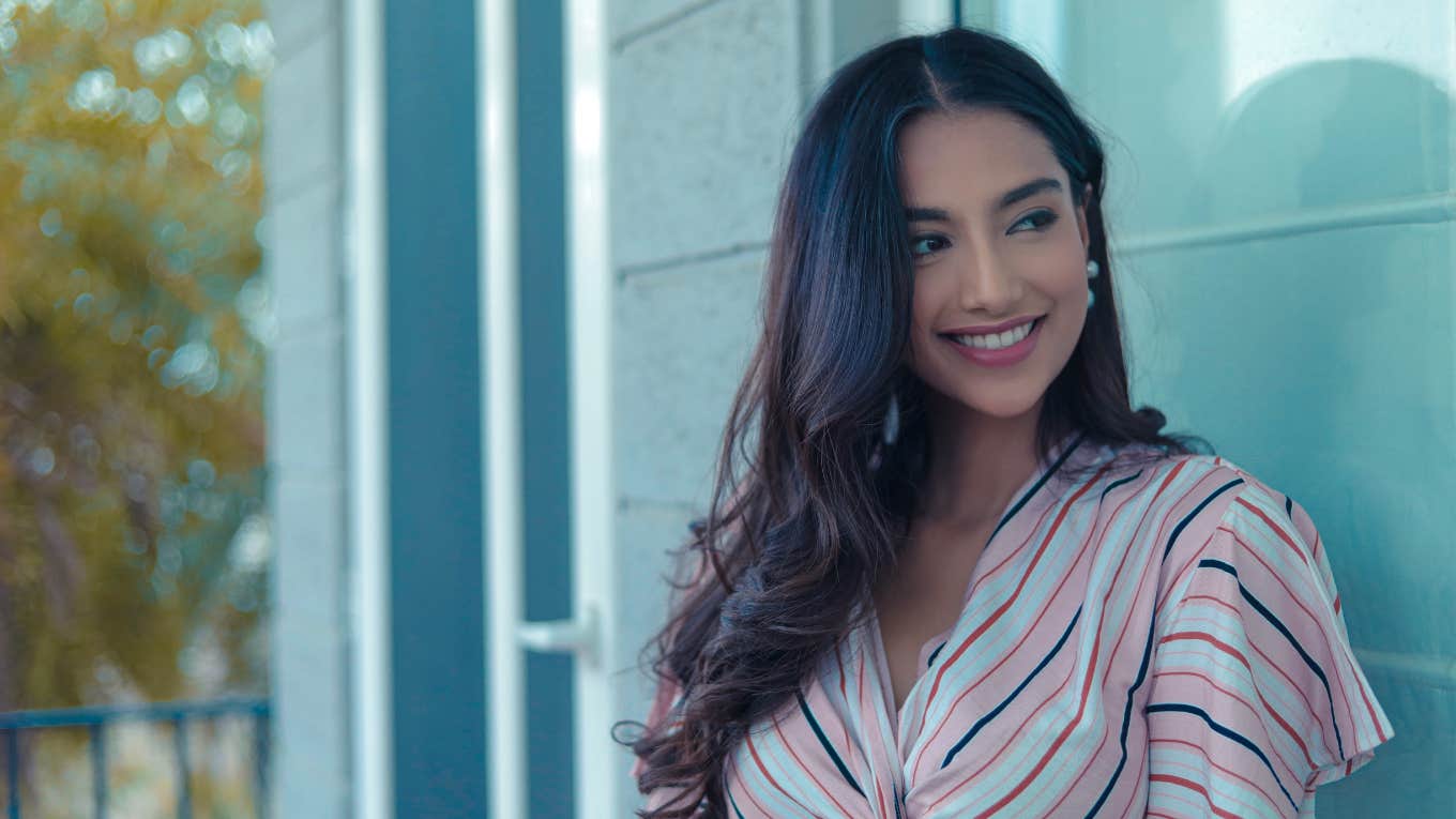 Men Are Wildly Into Women With These 3 Rare Qualities Woman smiling