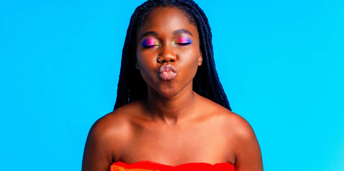 Toxic Attitudes That Make You Seem Like A Complete Jerk woman kissing the air