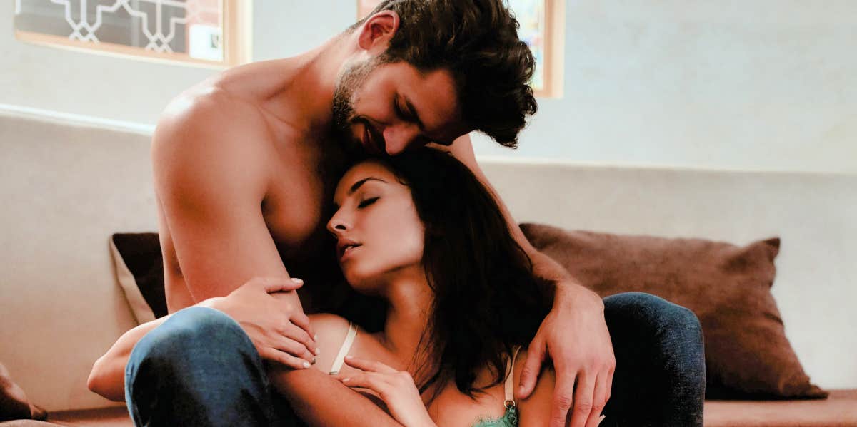 Tragic Ways You Turn Your Husband Off (Without Even Realizing It) man cuddling woman