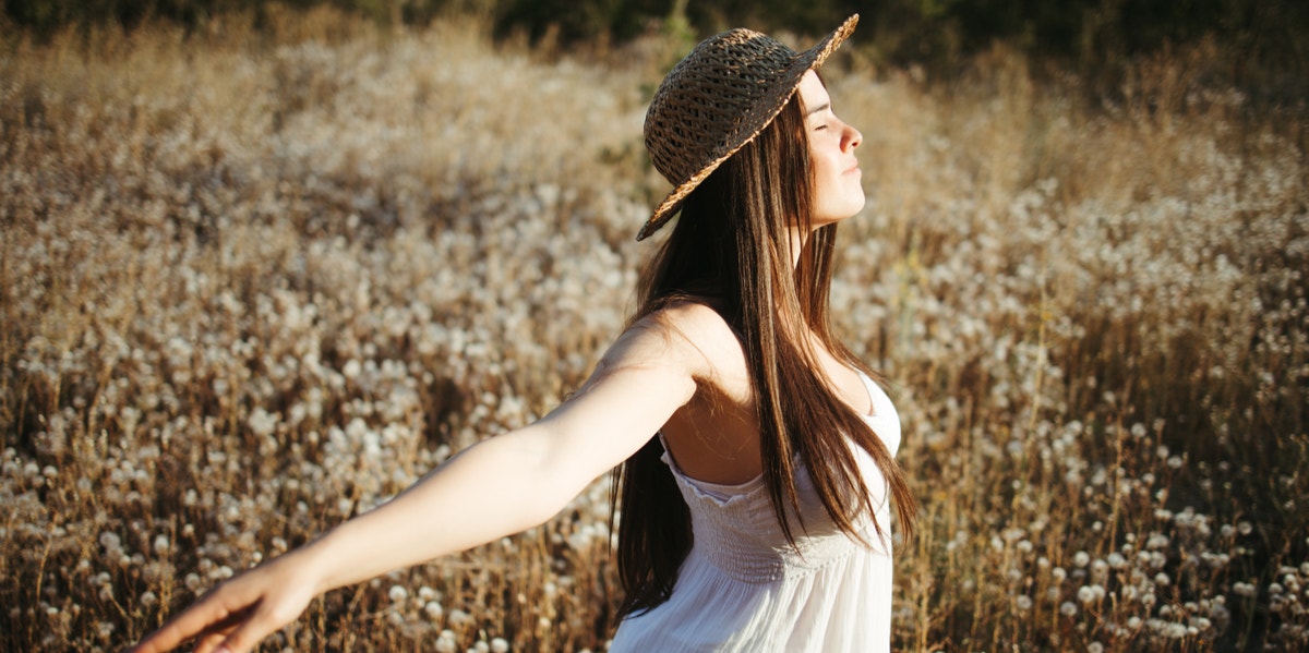 8 Introspective Questions To Ask To Restore Your Faith In Yourself woman in field