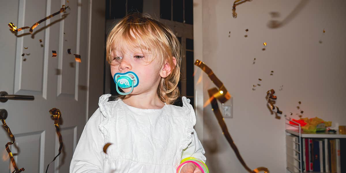 toddler with pacifier 