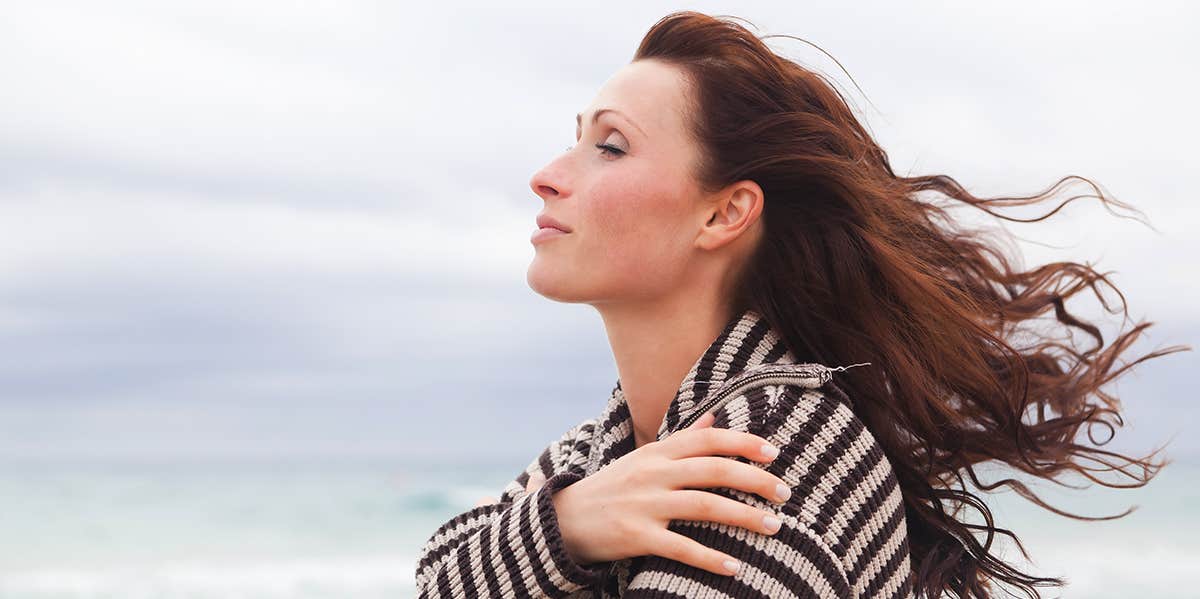 30 Proven Ways To Feel Better Instantly When You’re Down woman sitting outside