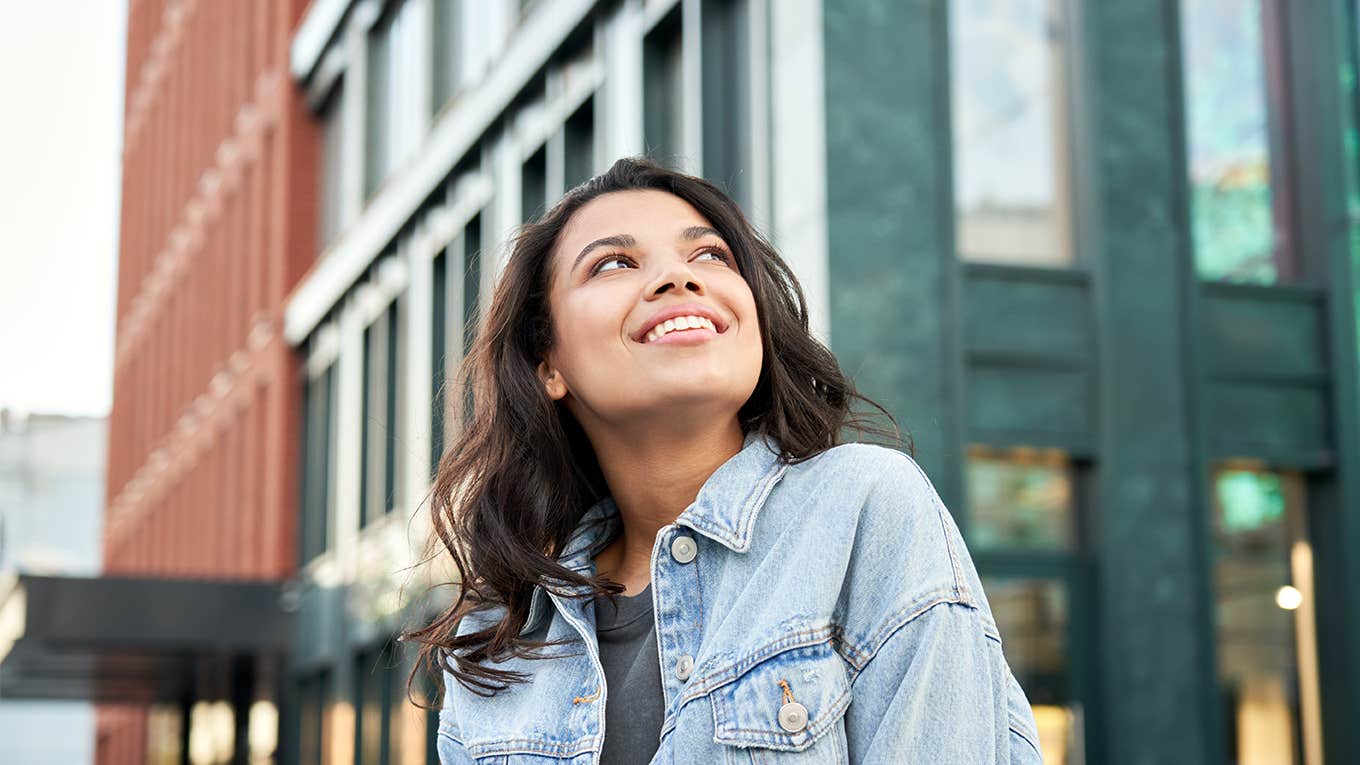 Confident happy beautiful young hipster African American woman