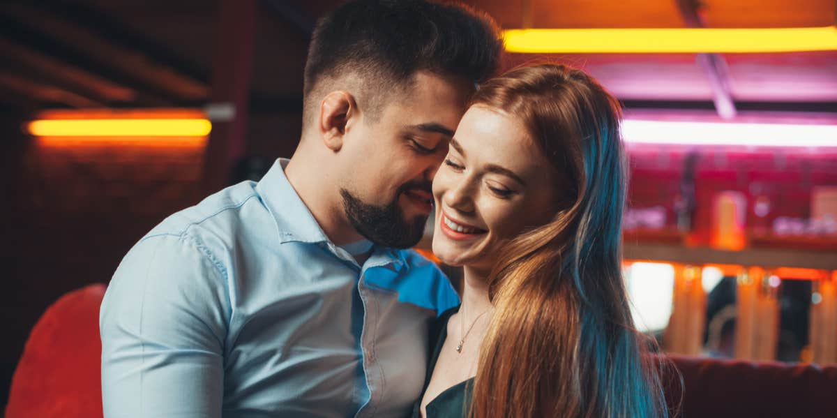 32 Signs He Doesn't Want To Date You — He's Just Leading You On man flirting with woman