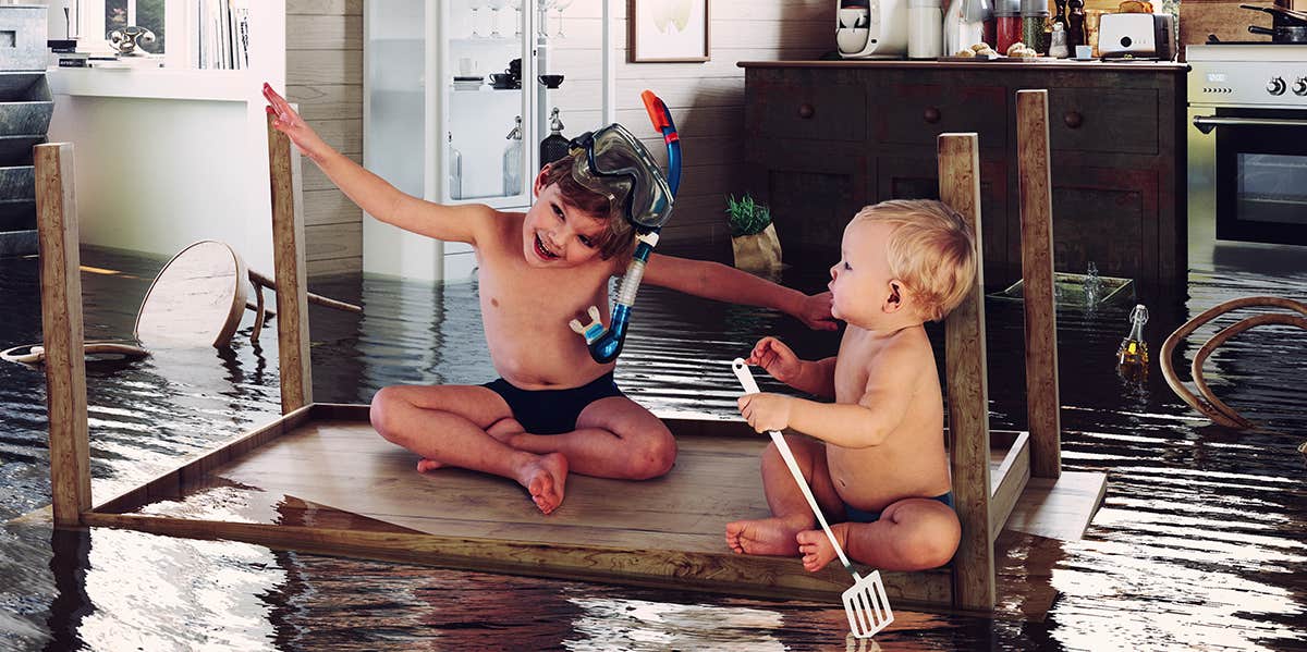 two brothers playing on floating table