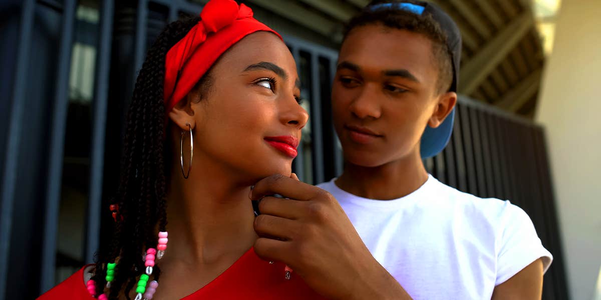 Flirty Ways To Catch His Eye man flirting with woman