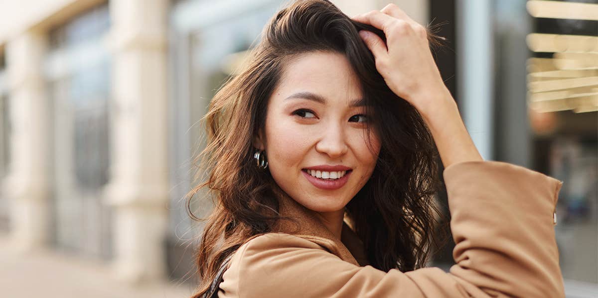 4 Ingredients Every Woman Needs To Create A Truly Happy Life smiling woman